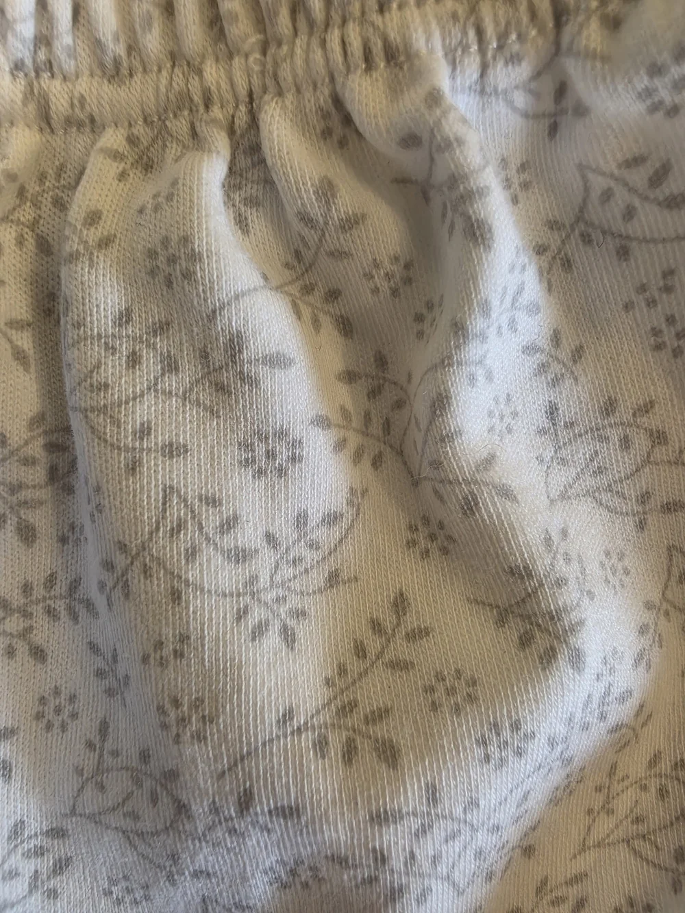 Cuclie Baby White/Gray Smocked Dress with Floral Print